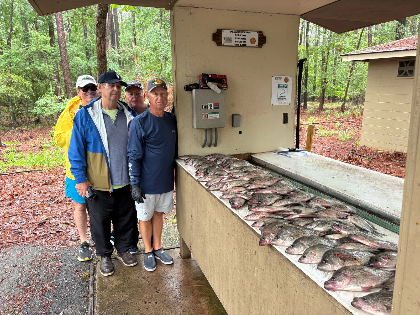 5 people enjoying fishing trip in GA