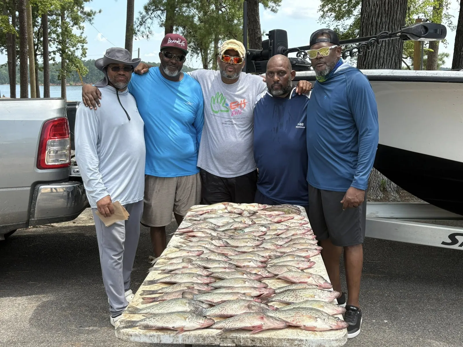 Group of 5 people fishing in Thomson