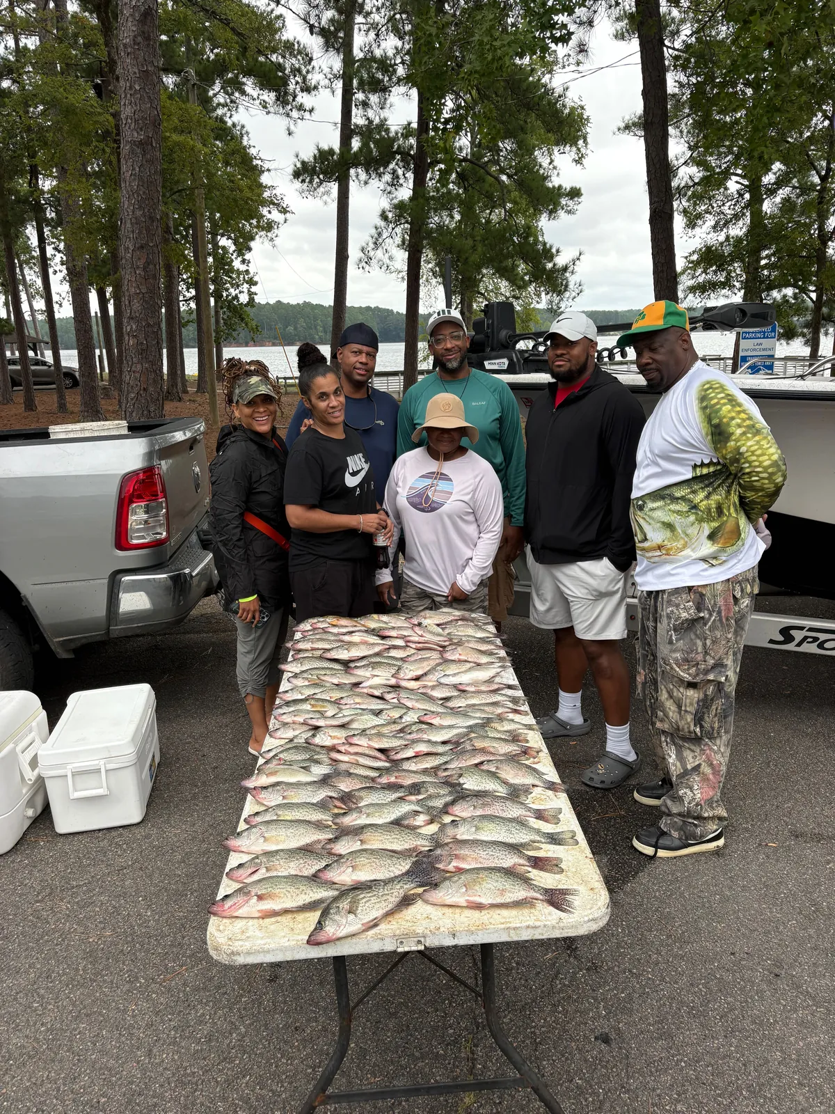 Group of 7 people fishing in Thomson